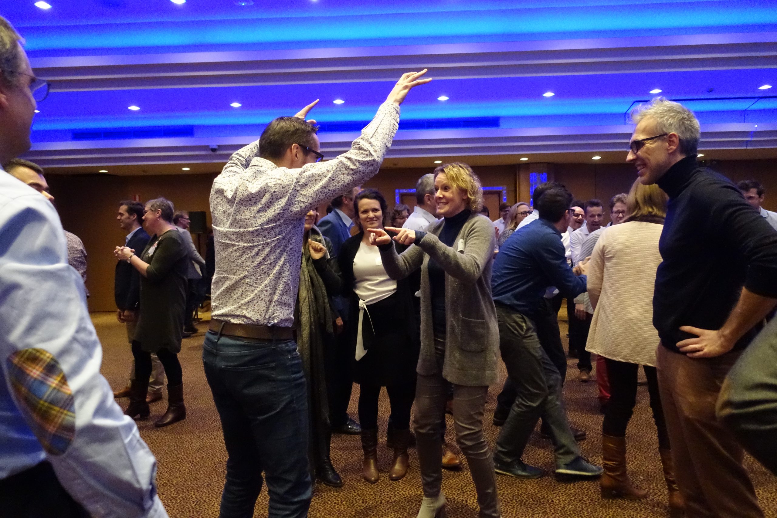 Laughter Yoga: a group laughs together